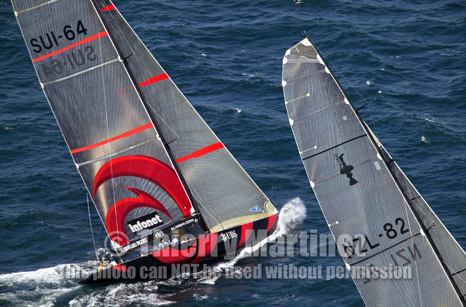03_0895D © Th.Martinez. Auckland   New Zealand. 15 02 03 America's Cup Day 1.Alinghi (SUI64) vs Team New Zealand (NZL82) SUI64 leading on NZL82 in the first upwind leg before team new zealand retired from the race.