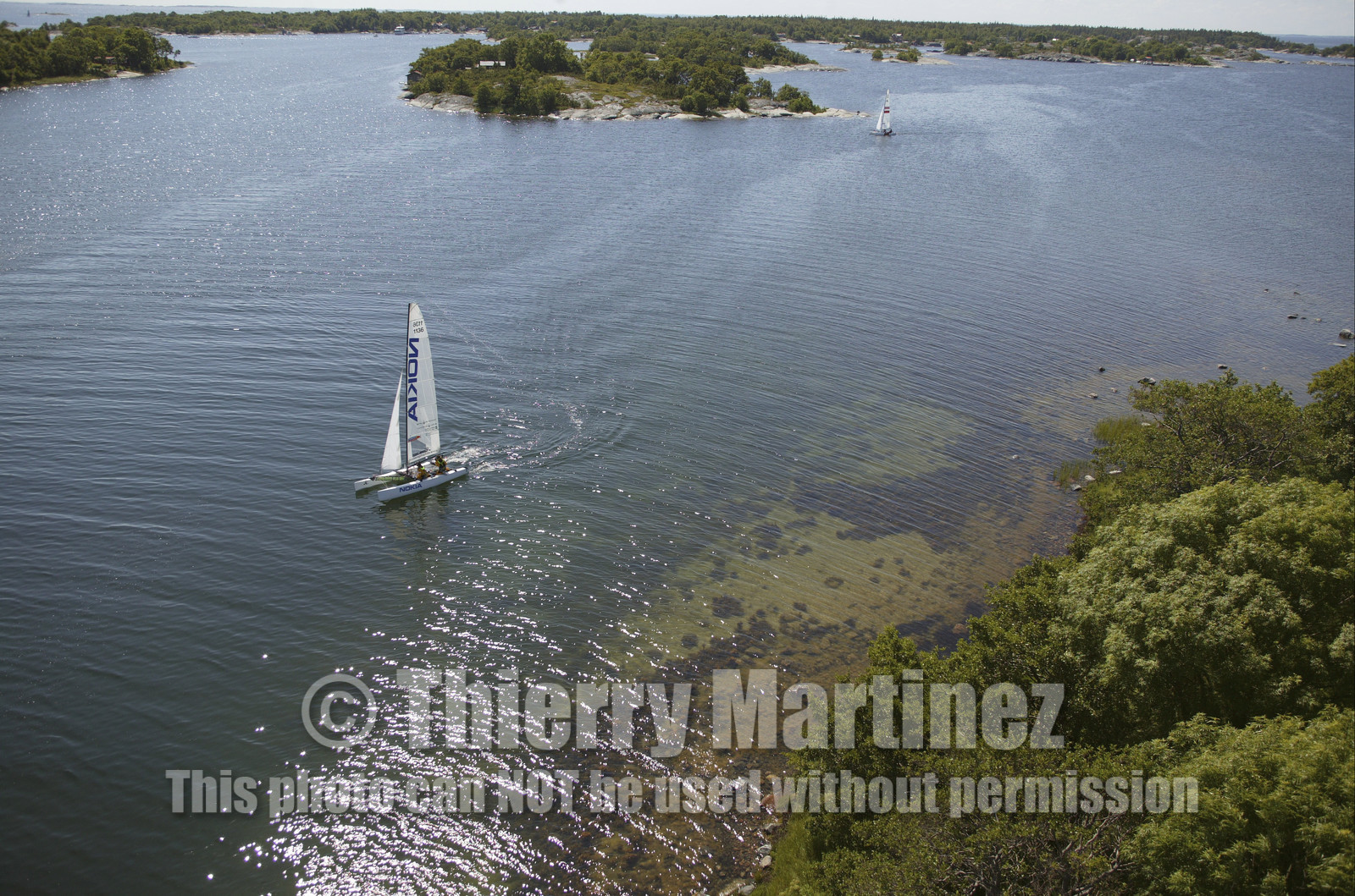 03_3163D   © Th.Martinez,STOCKHOLM ARCHIPELAGO SWEDEN, 9 07 03-Archipelago Raid (2003)  Day 2. Team NOKIA-Adilstam  .Frederik Aldistam (SWe) and Tomas Marimon (SWE) and JOBMAN