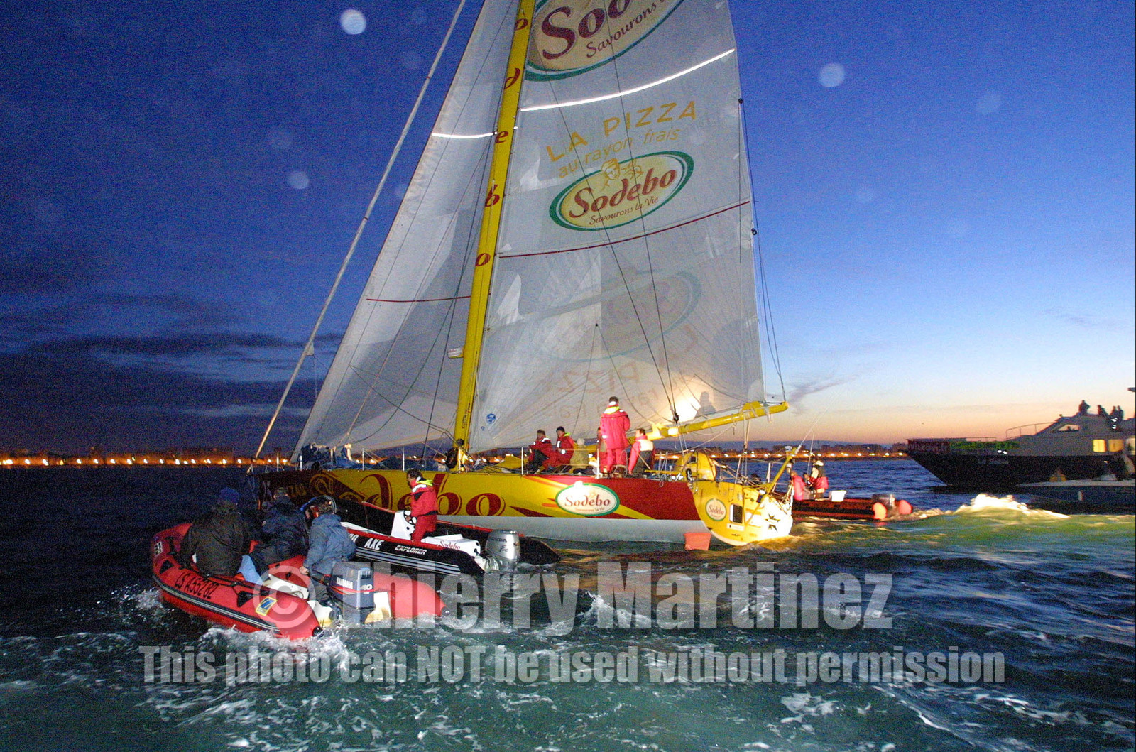 ©Thierry Martinez   Sea&Co. Vendee Globe Finish. les Sables d'Olonne (FRA) 23th february 2001. 07h15 (local time).Thomas Coville (FRA) SODEBO finishing 6th in single handed round the world race, in 105days 7h 24mn..Thomas had crossed the finish line at 23h35mn the day before.