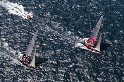 03_0892D © Th.Martinez. Auckland   New Zealand. 15 02 03 America's Cup Day 1.Alinghi (SUI64) vs Team New Zealand (NZL82) SUI64 setting up the pace in the beggining of the first upwind leg.