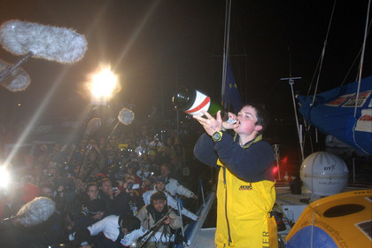 ©ThMartinez. Vendee Globe  finish. Sunday 11th February 2001..Ellen MacArthur (UK) KINGFISHER,24 yeras old celabrate her second place in Single hahnded race the world. Celebrate