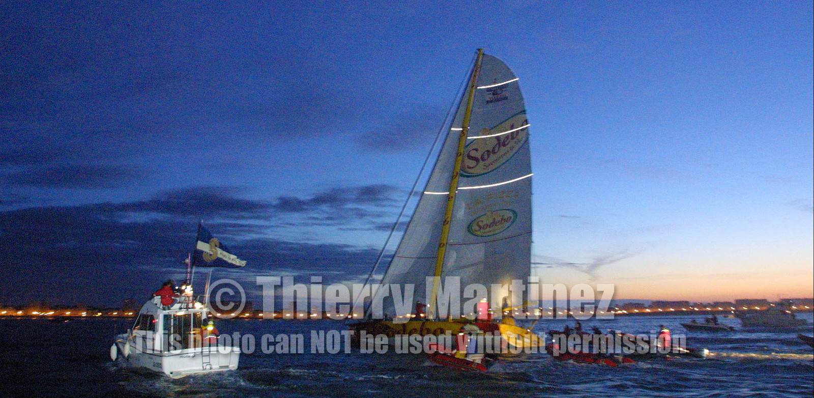 ©Th.Martinez. Vendee Globe Finish. les Sables d'Olonne (FRA) 23th february 2001. 07h15 (local time).Thomas Coville (FRA) SODEBO finishing 6th in single handed round the world race, in 105days 7h 24mn..Thomas had crossed the finish line at 23h35mn the day before.