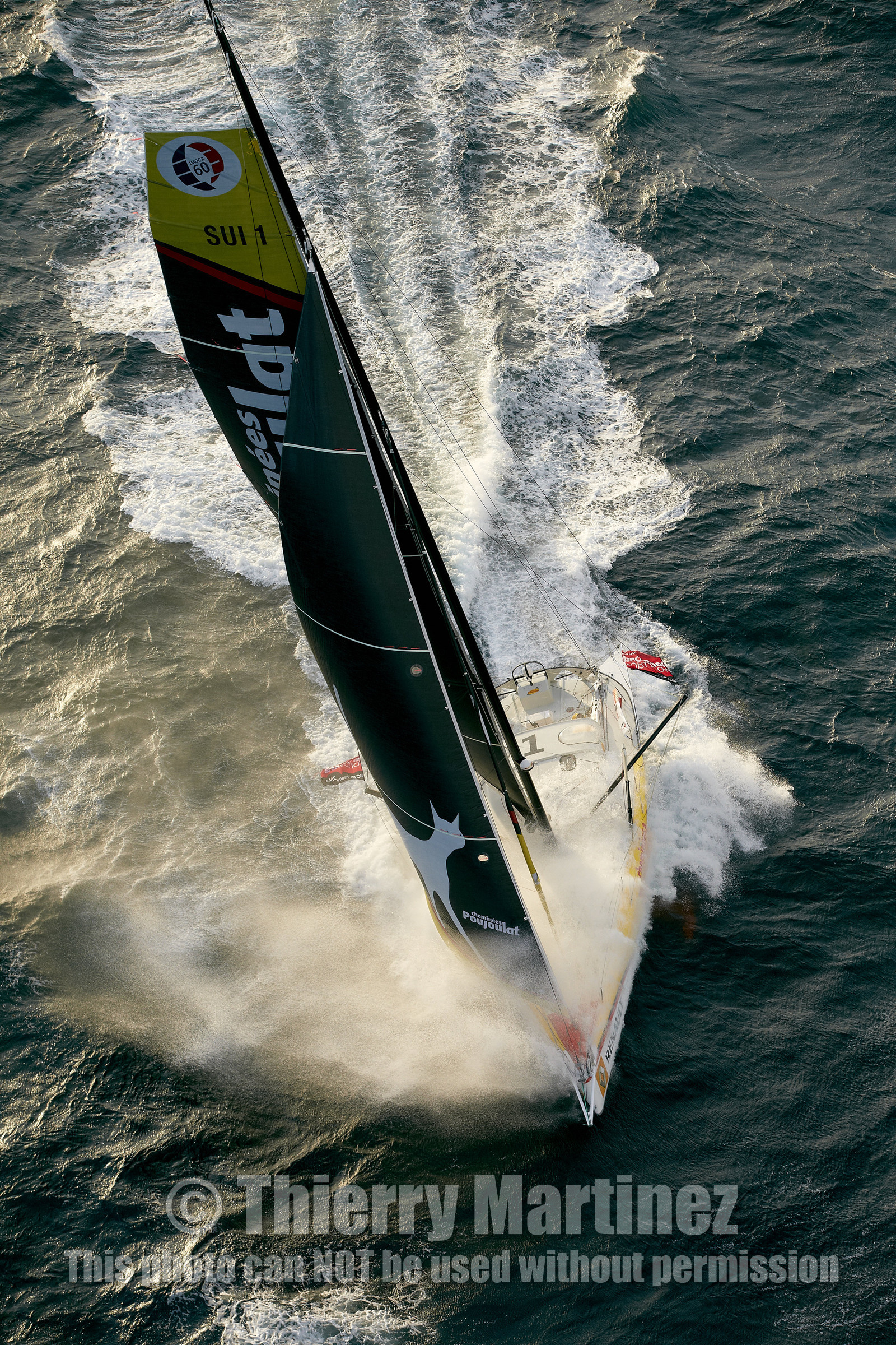 2014 BARCELONA WORLD RACE. Bernard Stamm (SUI) & Jean Le Cam (FRA) on CHEMINEES POUJOULAT