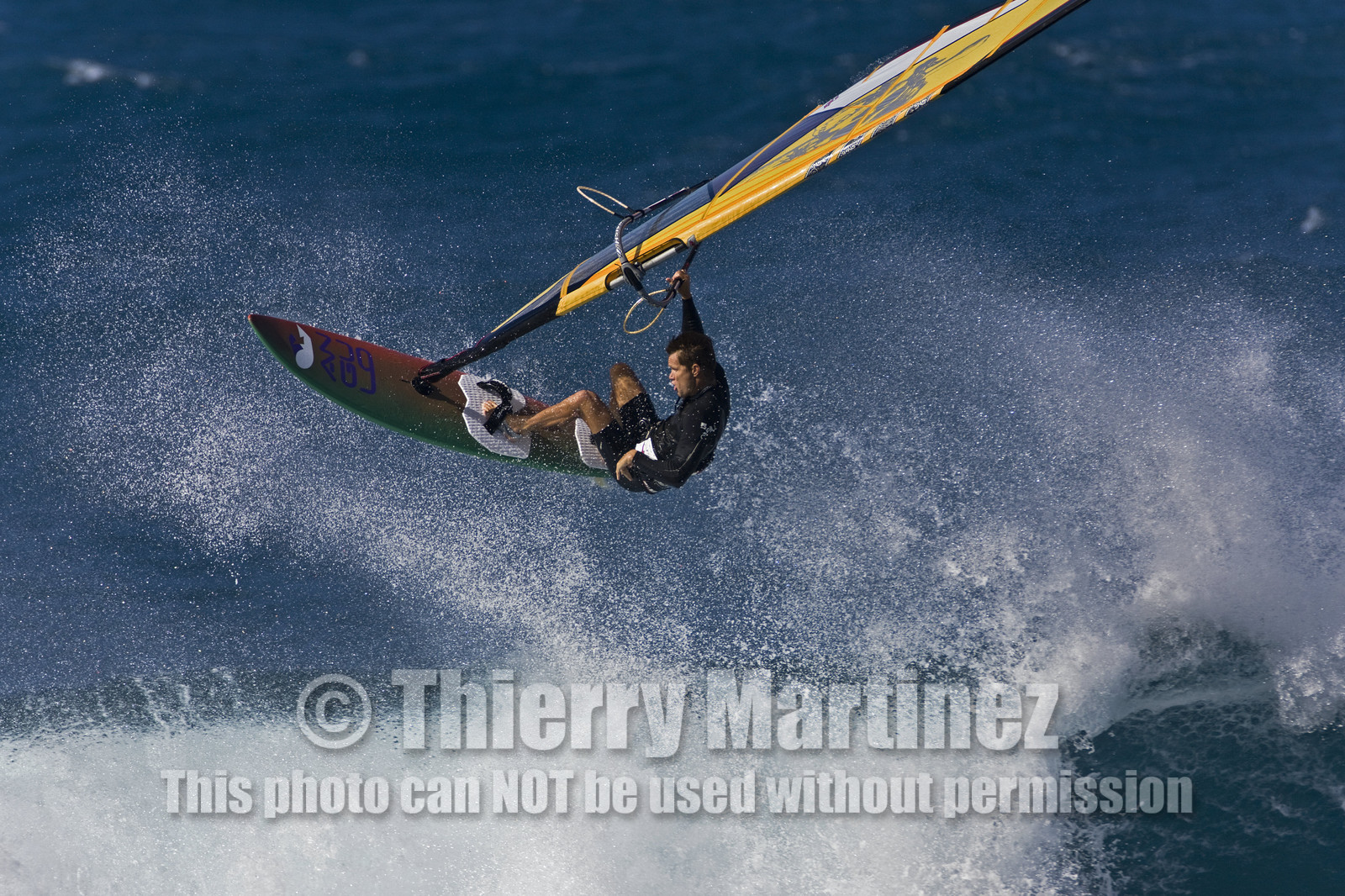 Windsurf in waves at Hookip'a Beach - North Shore Maui - Hawaii.