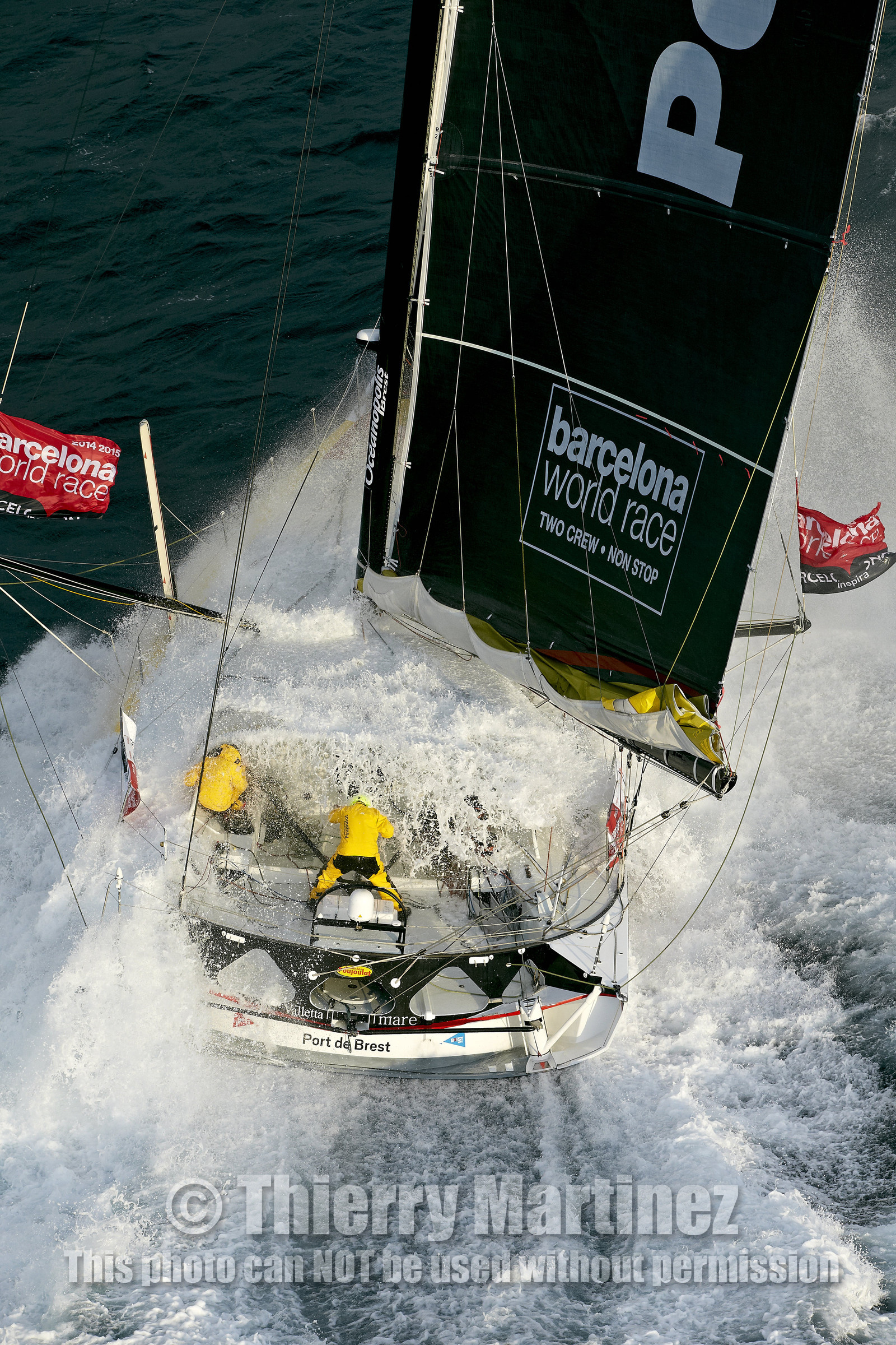 2014 BARCELONA WORLD RACE. Bernard Stamm (SUI) & Jean Le Cam (FRA) on CHEMINEES POUJOULAT