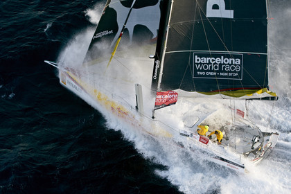 2014 BARCELONA WORLD RACE. Bernard Stamm (SUI) & Jean Le Cam (FRA) on CHEMINEES POUJOULAT