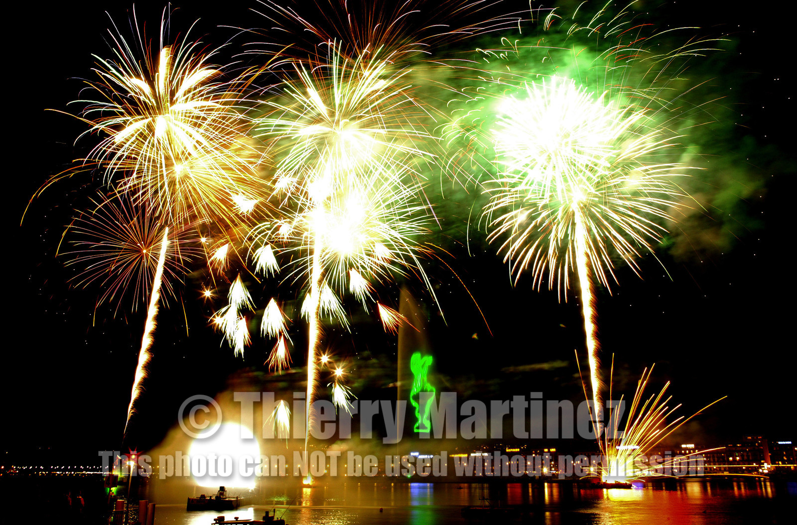 02281D ©Th.Martinez. Geneva , Switzerland. America's Cup 2003. 8th March 2003.Alinghi Team winner of America's Cup 2003..Welcome to Alinghi Team in Geneva.Firework and laser show by the lac...