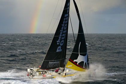 2014 BARCELONA WORLD RACE. Bernard Stamm (SUI) & Jean Le Cam (FRA) on CHEMINEES POUJOULAT
