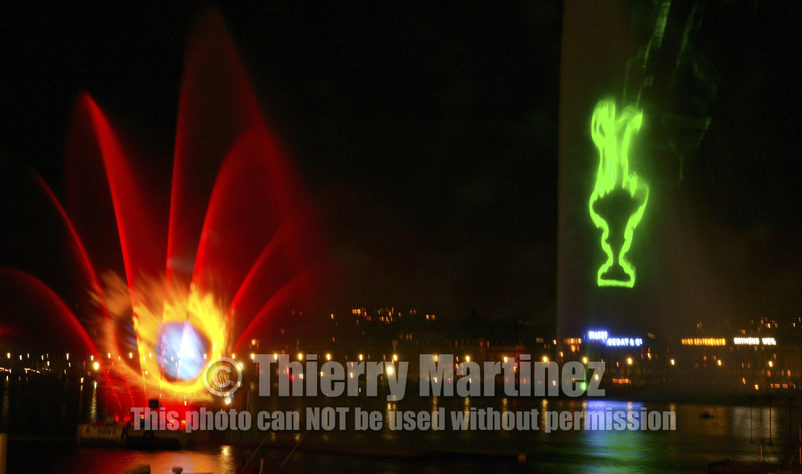 03_2274D ©Th.Martine. Geneva , Switzerland. America's Cup 2003. 8th March 2003.Alinghi Team winner of America's Cup 2003..Welcome to Alinghi Team in Geneva.Firework and laser show by the lac...